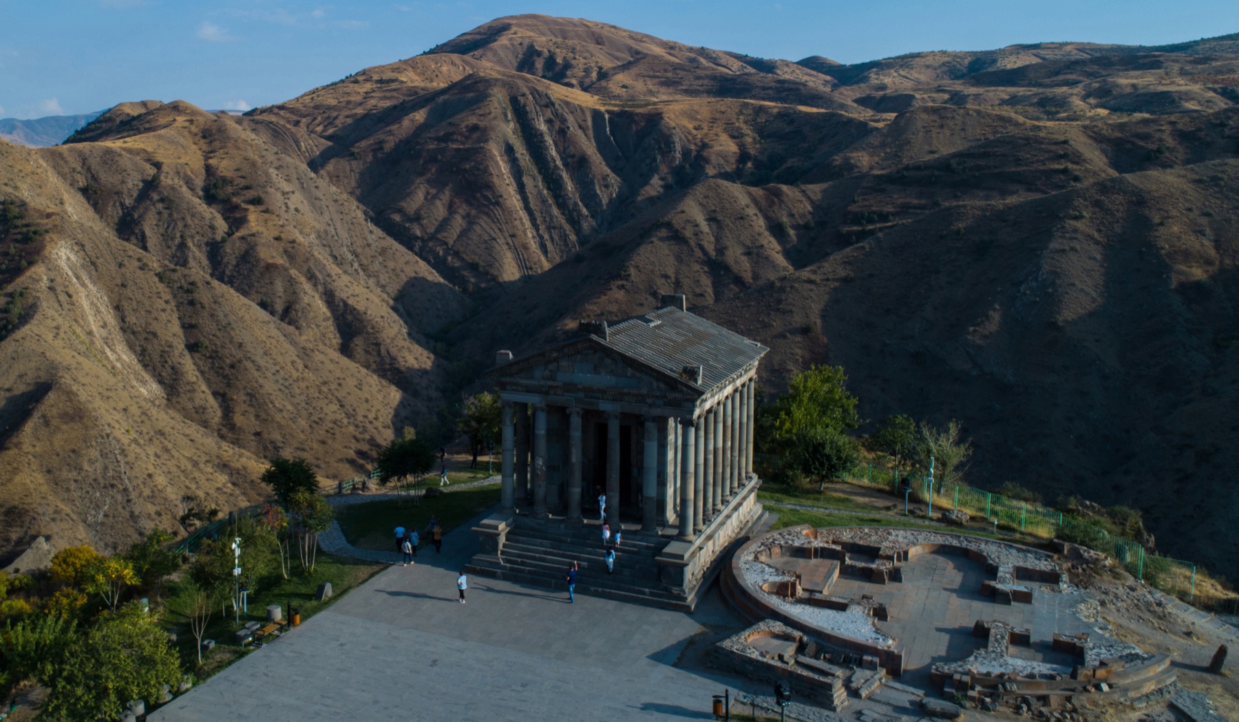 The classical Garni Temple set against the rugged mountains of the Garni gorge, Armenia